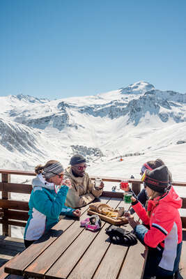 Group of friends on the terrace of Lo Soli in Tignes